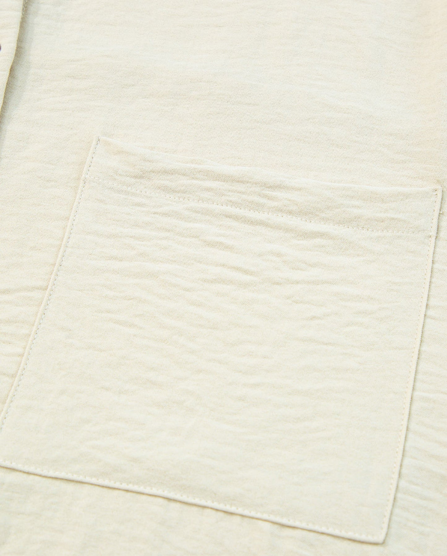 Beige pure color patch pocket shirt
